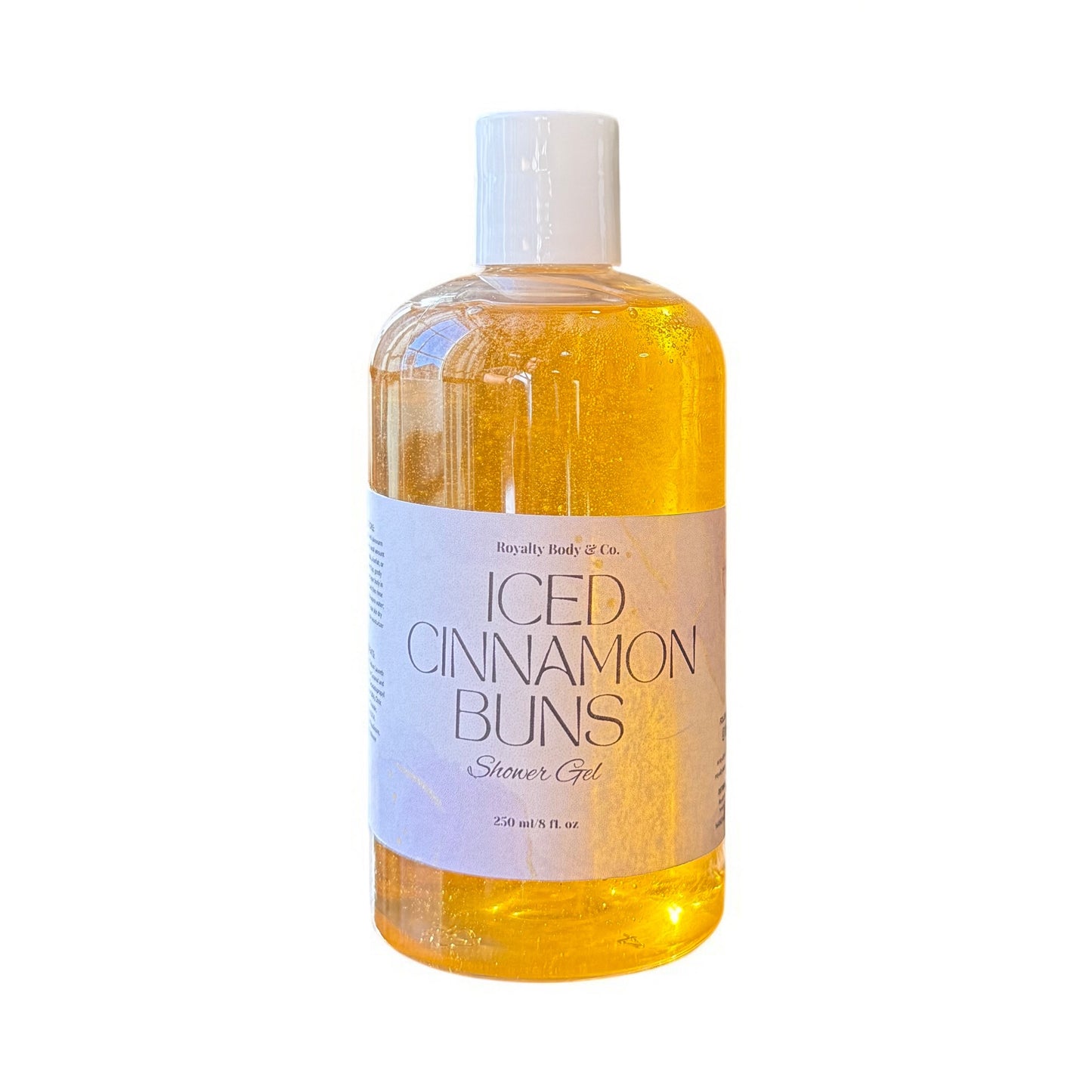 The Iced Cinnamon Buns Shower Gel by Royally Body & Co comes in a clear plastic 270 ml (9.1 fl oz) bottle with a white label and cap. Ideal for sensitive skin, it hydrates while providing an enticing scent.